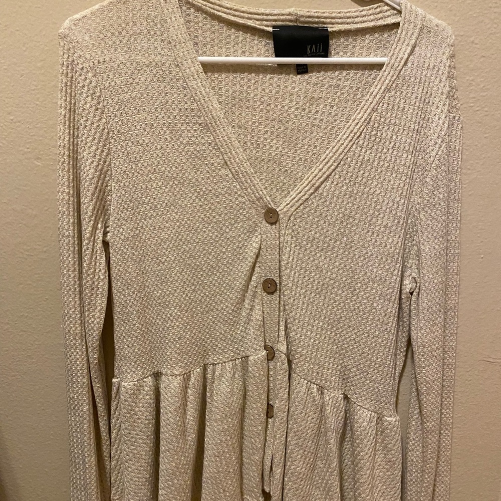 V neck button shirt.